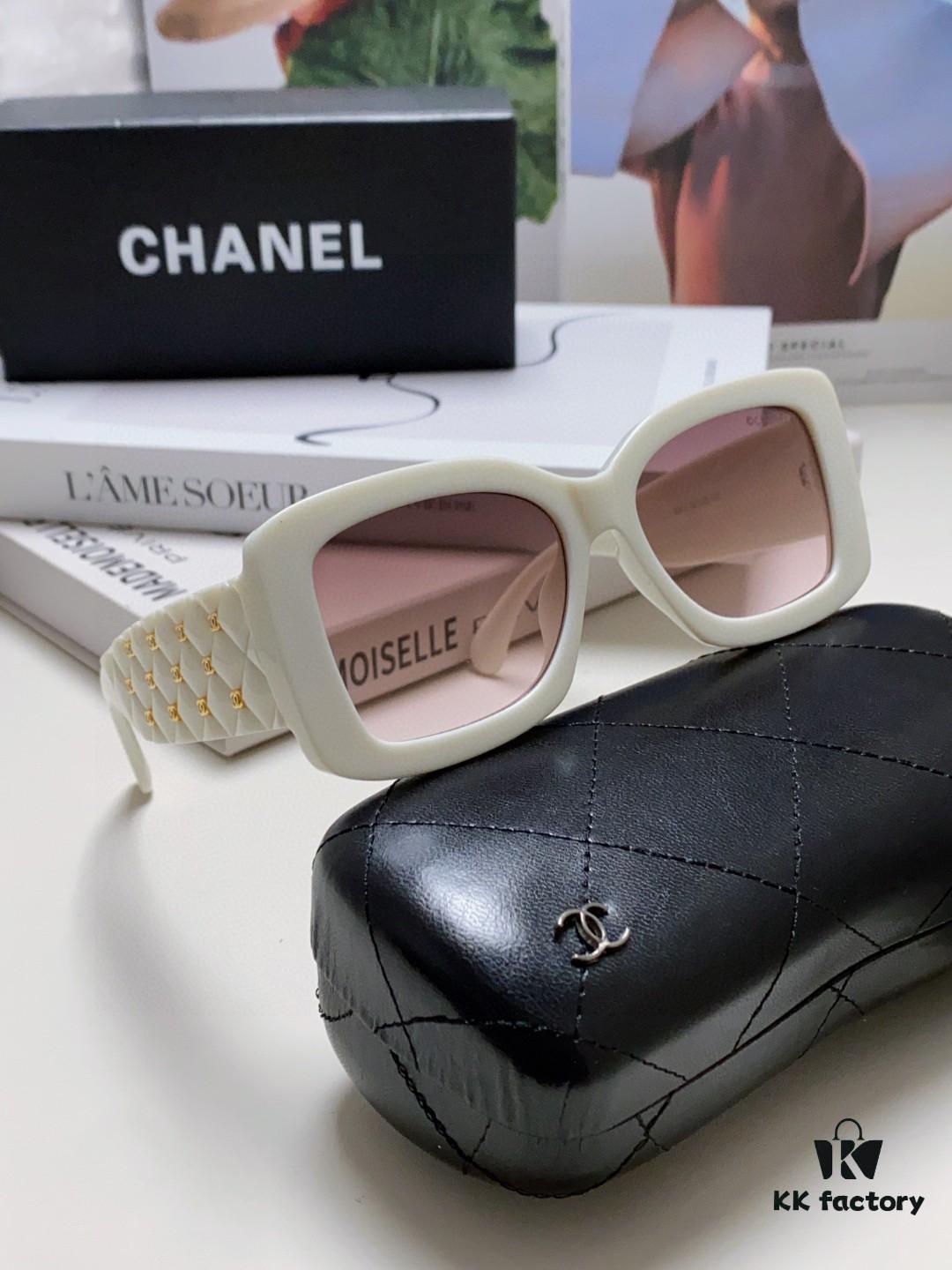 6931f82c3a89a121ed5497a7 CHANEL New Classic Black and White Sunglasses with Logo-Embellished Temples