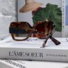 6931f9c33a89a121ed54ad9c PRADA Runway Showpiece - Color-Block Sporty Sunglasses