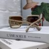 6931fa4f3a89a121ed54b3e4 PRADA 2024 New Handheld Suitcase Series Sunglasses