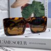 6931fa583a89a121ed54b457 Prada 2024 Fashionable Metal Polygonal Oversized Sunglasses for Men and Women with Checkered Lenses