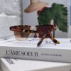 6931fa5d3a89a121ed54b49e Prada Sunglasses Classic Style with Premium Metal Logo on Temples and Frame