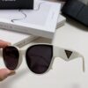 6931fa623a89a121ed54b4ec Prada 2024 New Arrival Sunglasses Fashionable Round Frame UV Protection Eyewear for Women