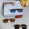 6931fb7a3a89a121ed54c261 Cartier 2025 New Arrival Wooden Texture Panther Decorated Frameless Bar Square Sunglasses, Fashionable Retro Gradient Color Tinted Glasses for Street Photography