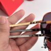 6931fbef3a89a121ed54c7e6 Cartier CT0165S Sunglasses, Size 58-16-145