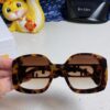 6931fca73a89a121ed54d174 FENDI Acetate O'Lock Sunglasses with Gold-Tone Metal Temples and Oversized O'Lock Logo
