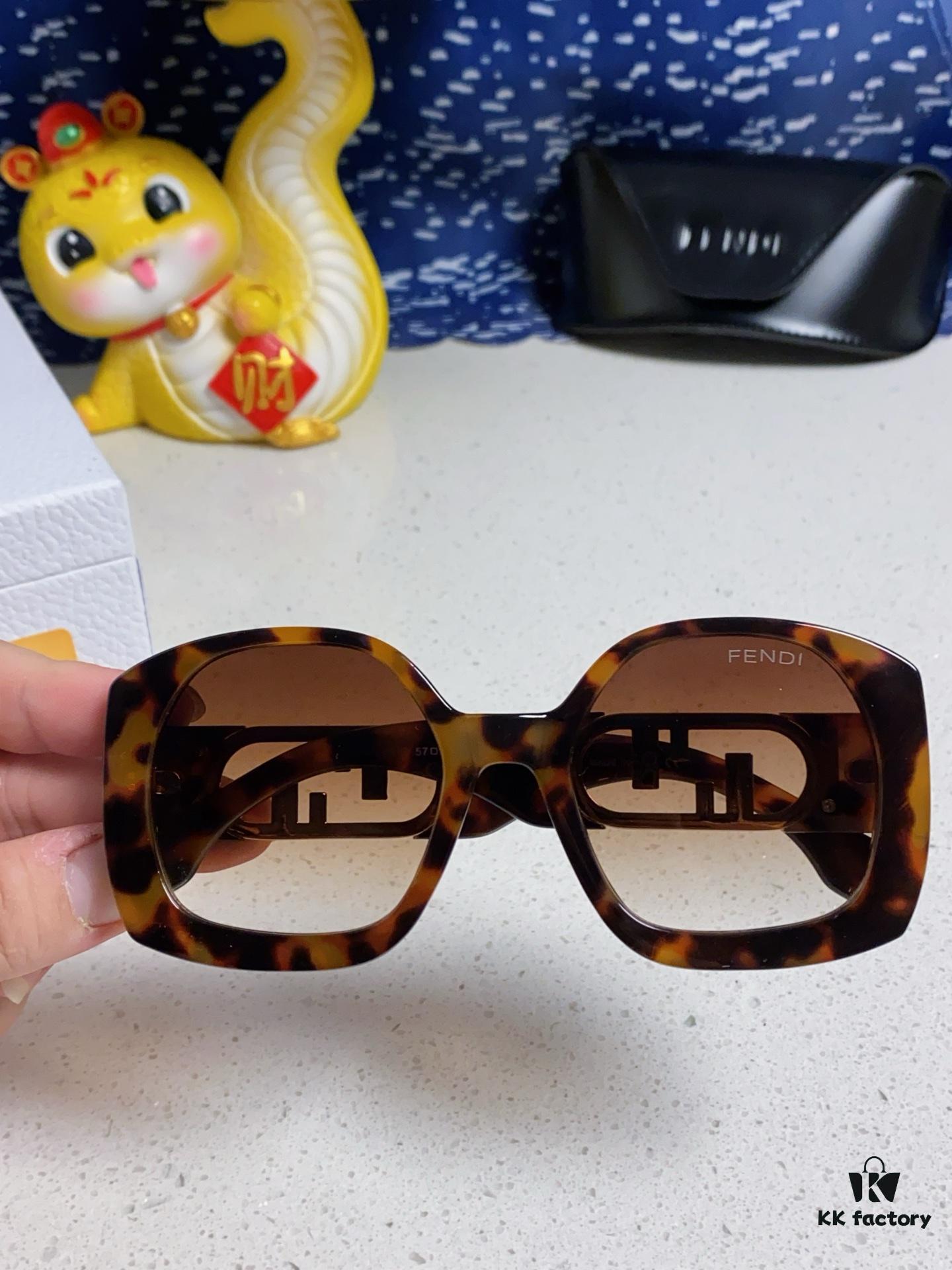 6931fca73a89a121ed54d174 FENDI Acetate O'Lock Sunglasses with Gold-Tone Metal Temples and Oversized O'Lock Logo