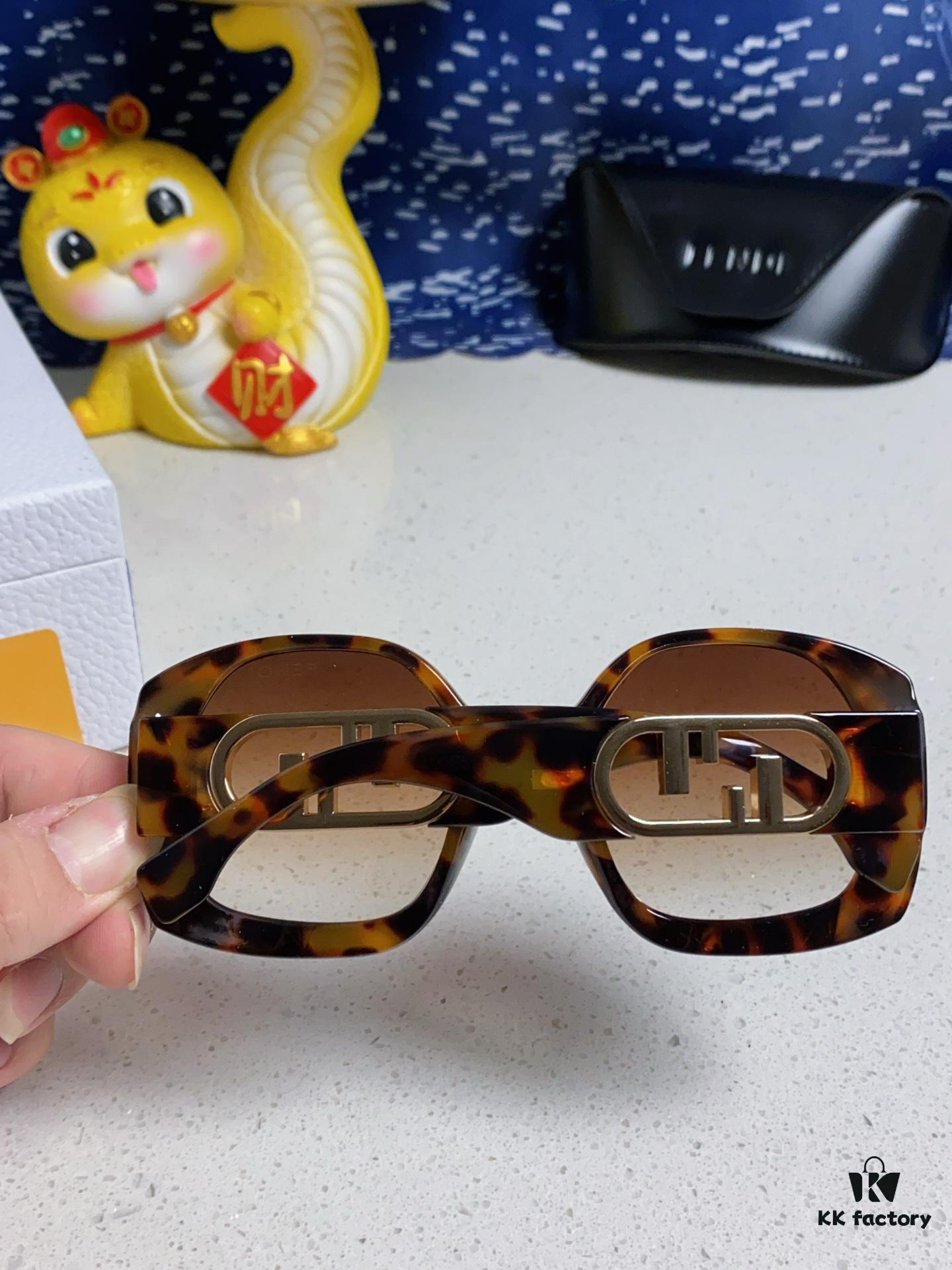 6931fca73a89a121ed54d175 FENDI Acetate O'Lock Sunglasses with Gold-Tone Metal Temples and Oversized O'Lock Logo