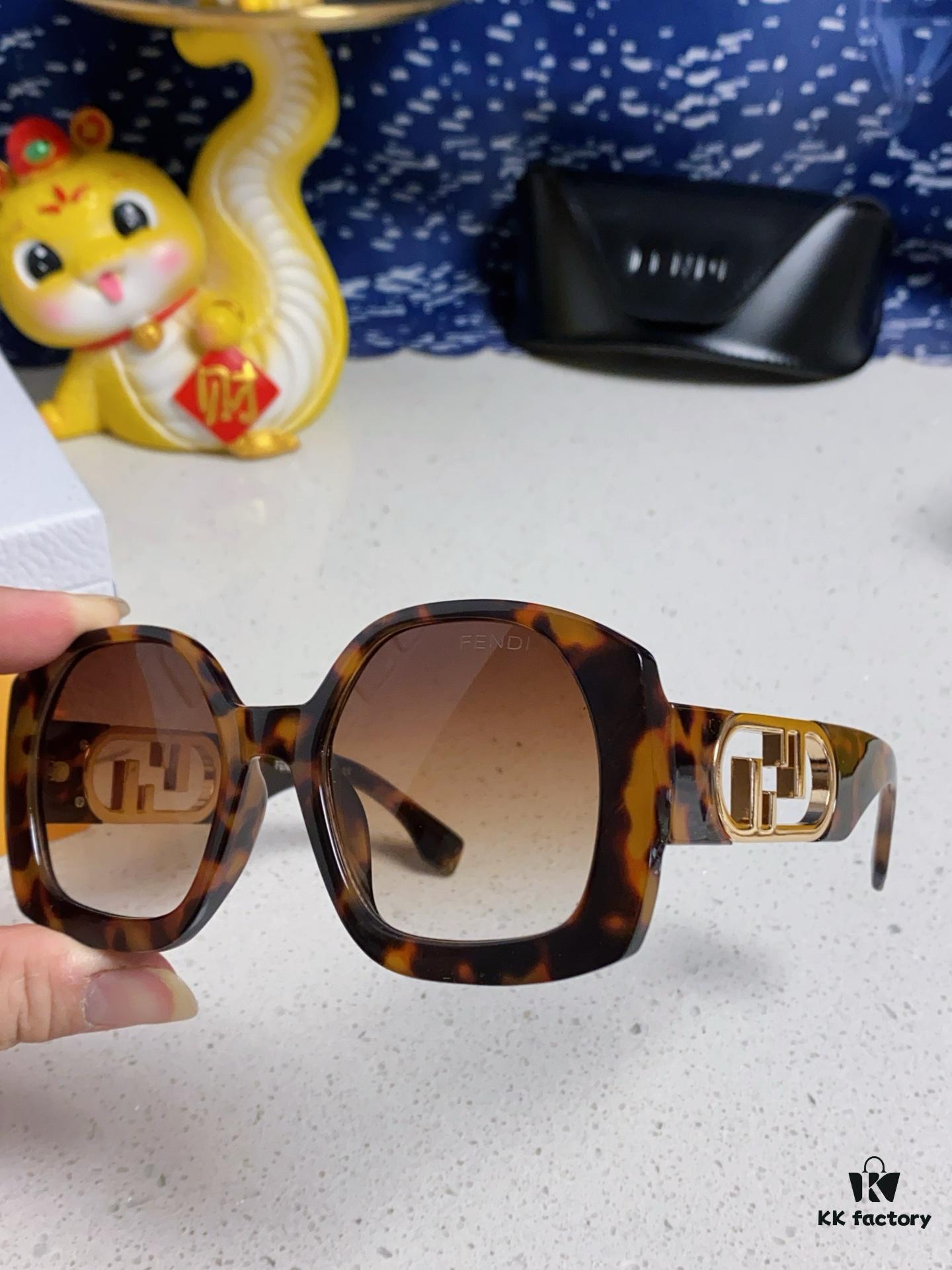 6931fca73a89a121ed54d176 FENDI Acetate O'Lock Sunglasses with Gold-Tone Metal Temples and Oversized O'Lock Logo