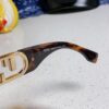 6931fca73a89a121ed54d177 FENDI Acetate O'Lock Sunglasses with Gold-Tone Metal Temples and Oversized O'Lock Logo