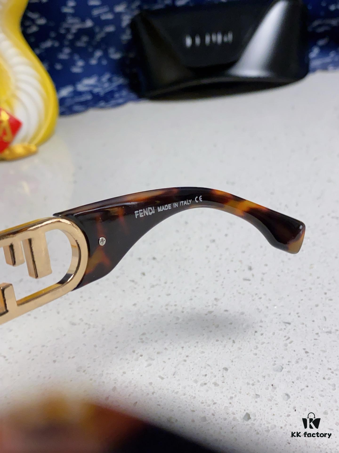 6931fca73a89a121ed54d177 FENDI Acetate O'Lock Sunglasses with Gold-Tone Metal Temples and Oversized O'Lock Logo