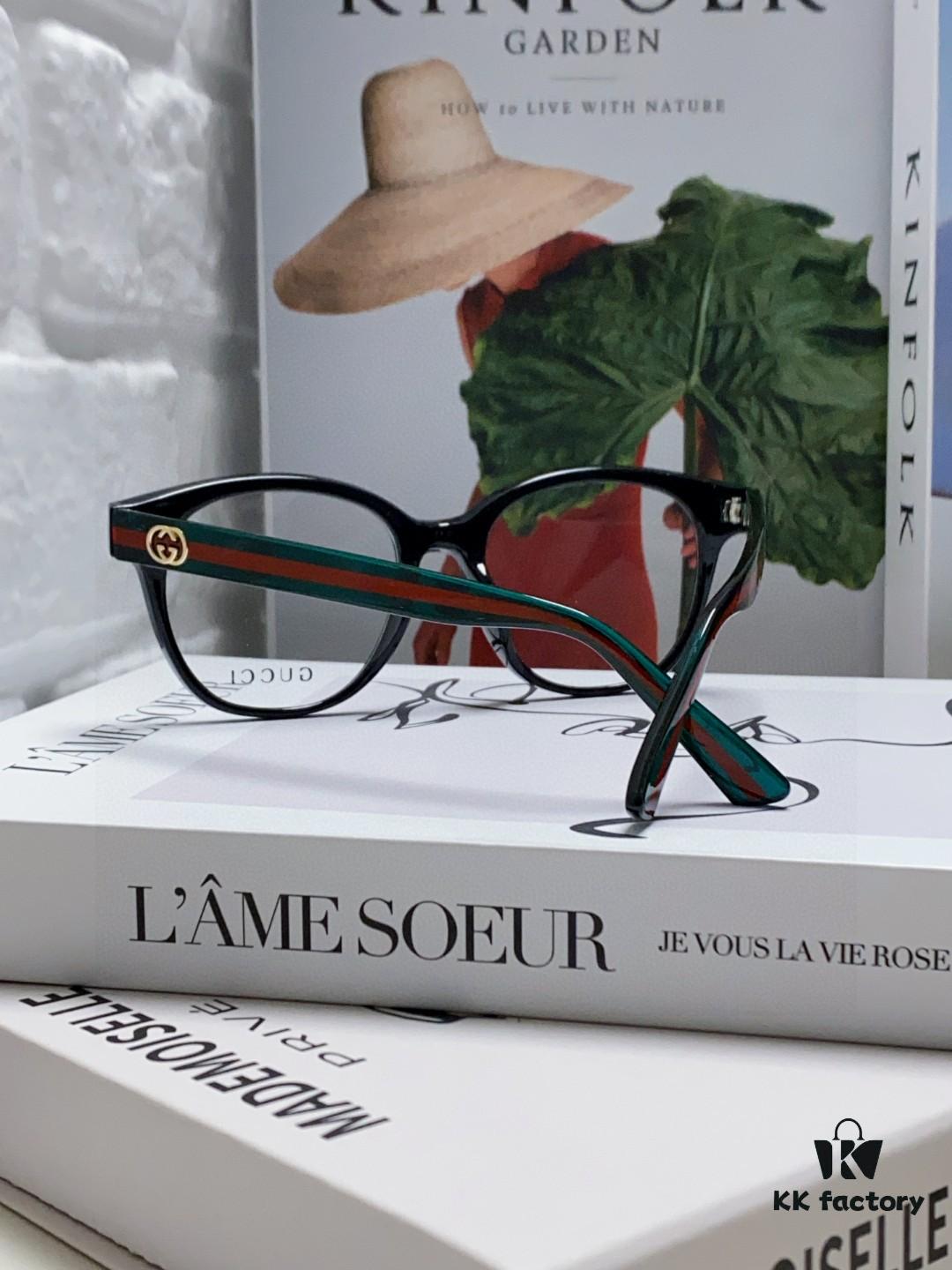 6931fe573a89a121ed54e781 Gucci 2025 New Arrival Women's Woven Art Close-up Frame Black Fashion Sunglasses with Classic Red and Green Band