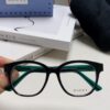 6931fe573a89a121ed54e782 Gucci 2025 New Arrival Women's Woven Art Close-up Frame Black Fashion Sunglasses with Classic Red and Green Band