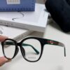 6931fe583a89a121ed54e784 Gucci 2025 New Arrival Women's Woven Art Close-up Frame Black Fashion Sunglasses with Classic Red and Green Band