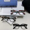 6931fe583a89a121ed54e787 Gucci 2025 New Arrival Women's Woven Art Close-up Frame Black Fashion Sunglasses with Classic Red and Green Band