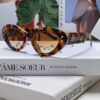 6931fe8e3a89a121ed54ea57 DIOR Cat-Eye Fashion Women's Sunglasses with Classic Two-Tone Design