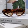 6931fe8f3a89a121ed54ea58 DIOR Cat-Eye Fashion Women's Sunglasses with Classic Two-Tone Design