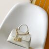 Louis Vuitton This Nano Madeleine handbag reimagines the Madeleine in Monogram Empreinte leather.