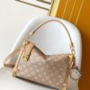 Louis Vuitton This "LV Travels With" edition of the large Side Trunk handbag showcases the brand's collaboration with a fashion icon and artist.