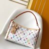 Louis Vuitton This Carryall East-West canvas handbag illuminates this classic element with a vibrant splash of color.