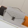 Louis Vuitton The Pochette Métis handbag interprets classic collegiate style through a design that is understated yet full of ingenious details.