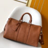 Louis Vuitton Keepall Bandoulière 35 Bag — This practical and versatile Keepall Bandoulière