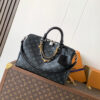 Louis Vuitton This Speedy Soft 30 handbag, part of the Ski Collection, reimagines the classic design in Monogram Eclipse canvas.