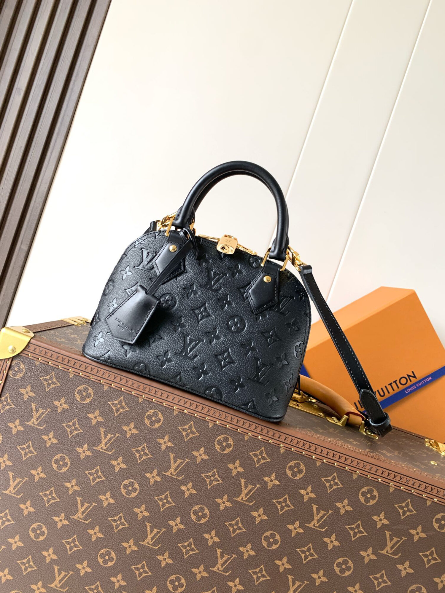 Louis Vuitton This Alma BB handbag showcases the iconic Alma BB silhouette, crafted from the House's exceptionally soft Monogram Empreinte leather.
