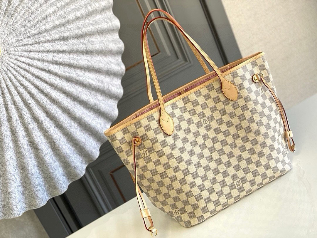 Louis Vuitton The legendary Neverfull handbag: always ready to meet your every need.