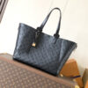 Louis Vuitton True to its name, this medium-sized "All In One" handbag is designed to be versatile, effortlessly transforming into either a tote or a Hobo bag.