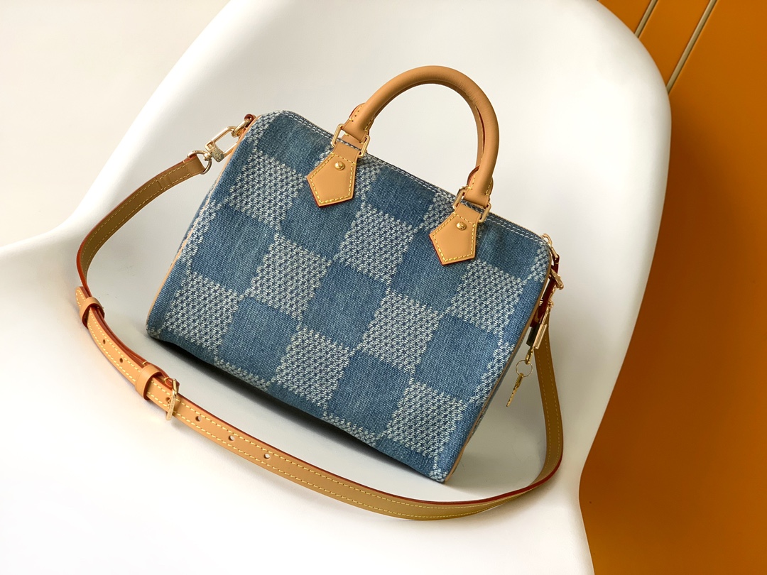 Louis Vuitton The new FW Denim Speedy 25 handbagâwhether worn crossbody...