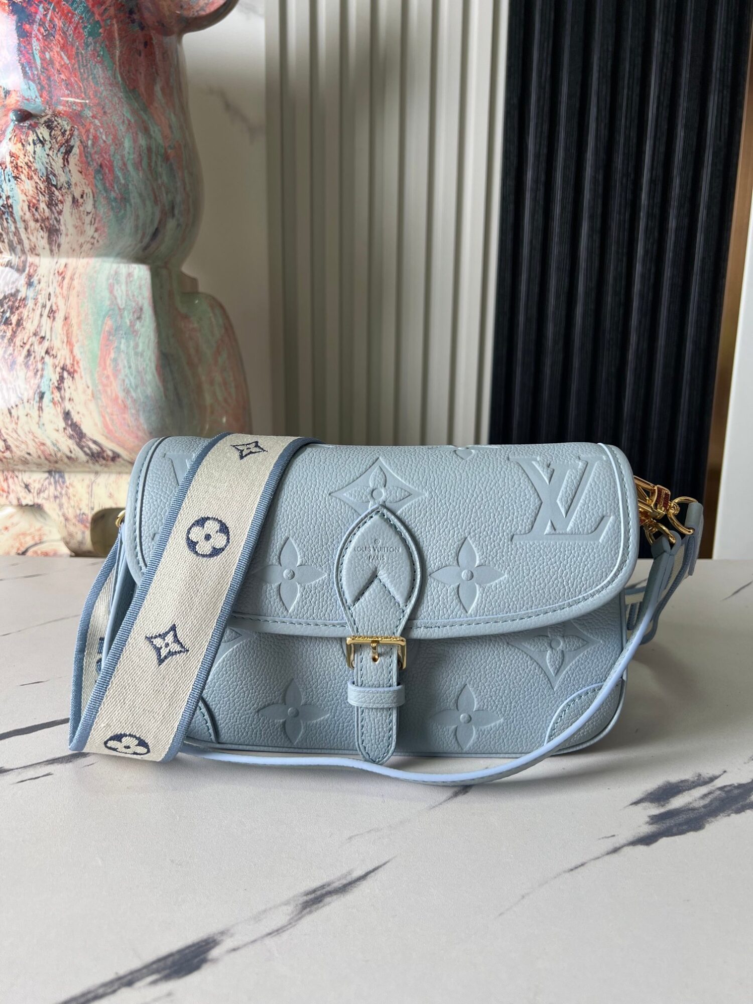 Louis Vuitton This Diane handbag infuses Monogram Empreinte embossed leather with elegant tones.