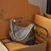 Louis Vuitton Crafted from classic Monogram canvas, this small Boulogne handbag features a double-zip closure and a spacious interior flat pocket large enough to accommodate a smartphone.