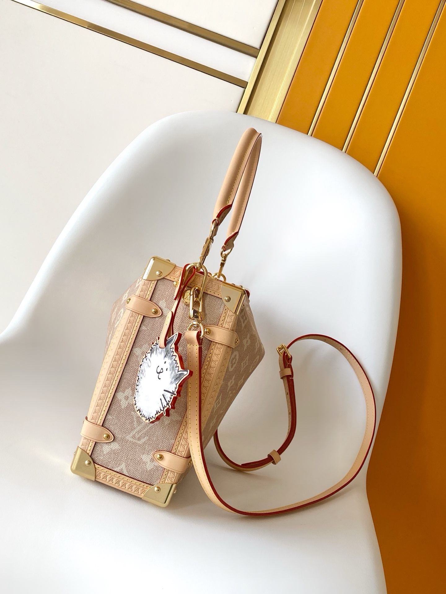 1 Louis Vuitton This "LV Travels With" edition of the large Side Trunk handbag showcases the brand's collaboration with a fashion icon and artist.