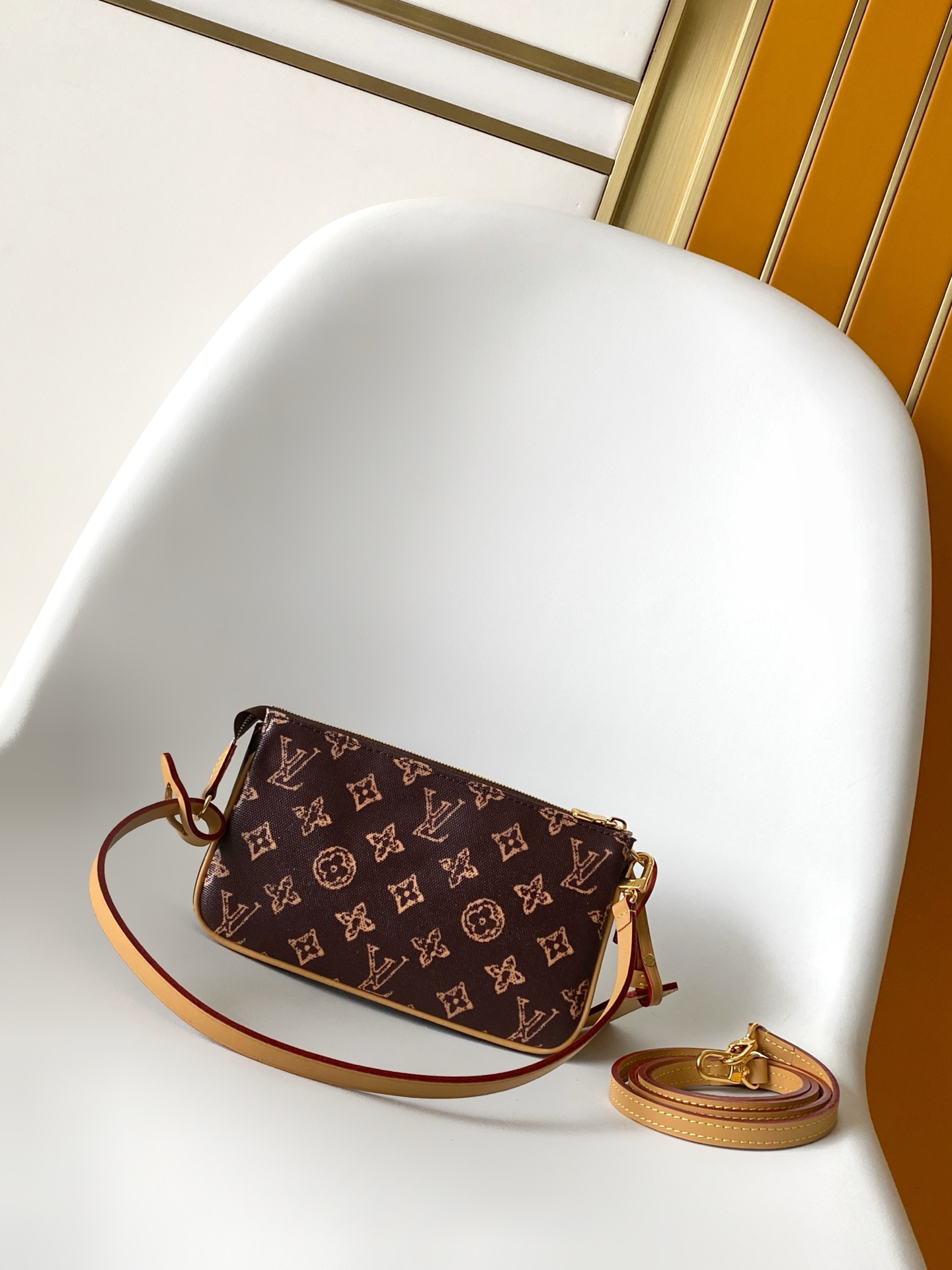 1 Louis Vuitton This Pochette Accessoires handbag is specially designed to celebrate the birth of the Louis Vuitton Monogram pattern.