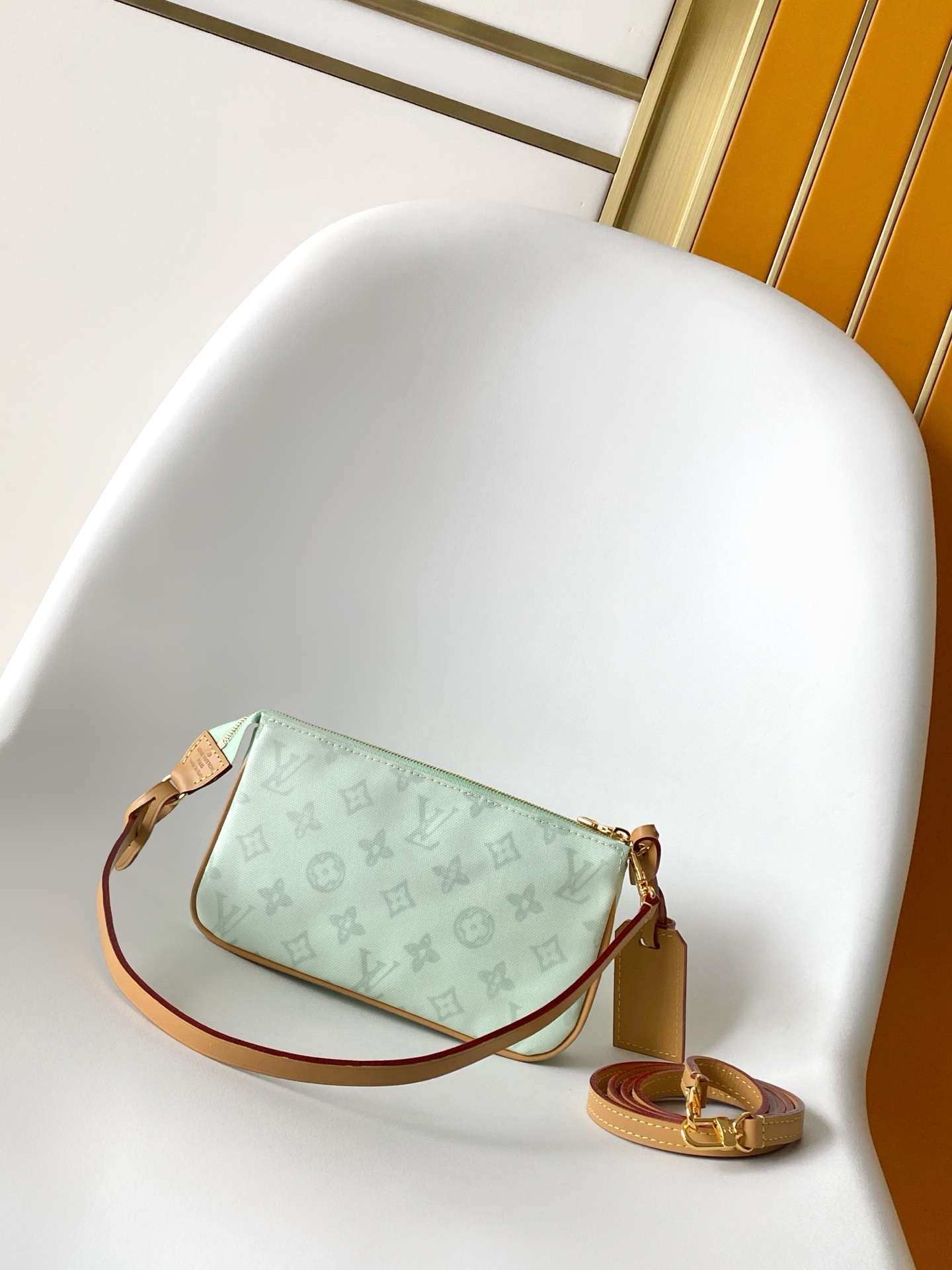 1 Louis Vuitton This Pochette Accessoires handbag is specially designed to celebrate the birth of the Louis Vuitton Monogram pattern.