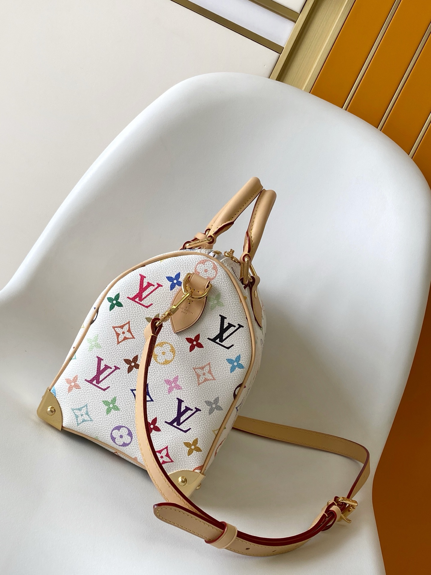 1 Louis Vuitton The M13085 Speedy Bandoulière 25 handbag features the classic Monogram pattern.