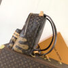 1 Louis Vuitton This Discovery Small Backpack features Monogram canvas accented with Monogram Reverse and Damier canvas patches.