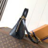 Louis Vuitton This Alma BB handbag showcases the iconic Alma BB silhouette, crafted from the House's exceptionally soft Monogram Empreinte leather.