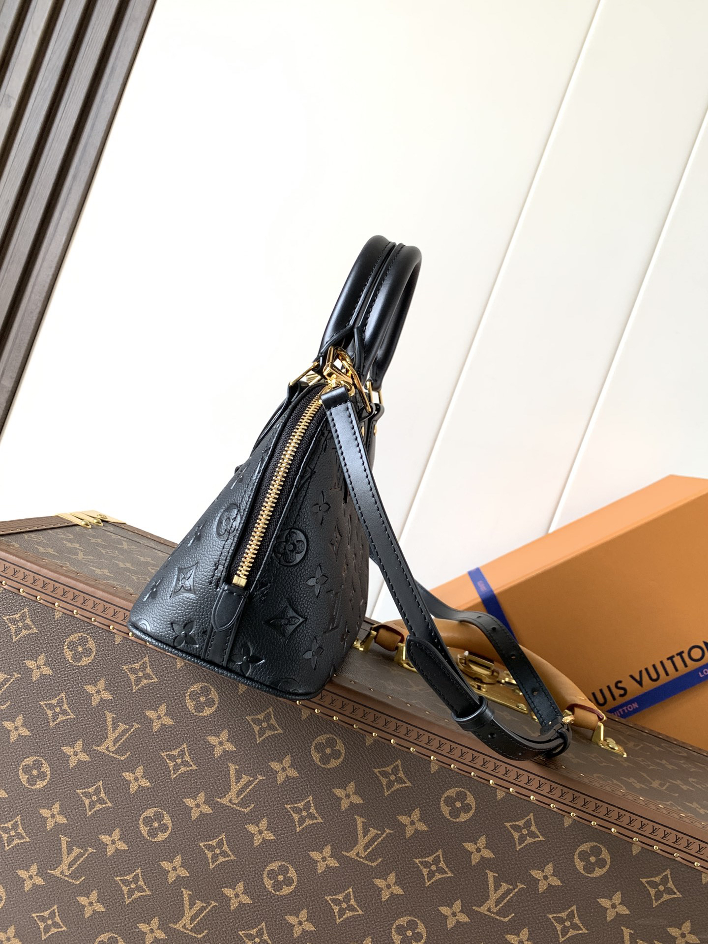 Louis Vuitton This Alma BB handbag showcases the iconic Alma BB silhouette, crafted from the House's exceptionally soft Monogram Empreinte leather.