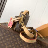 1 Louis Vuitton This Nil messenger bag features a Monogram canvas body accented with Damier and Monogram Reverse canvas patches, creating an elegant patchwork effect.