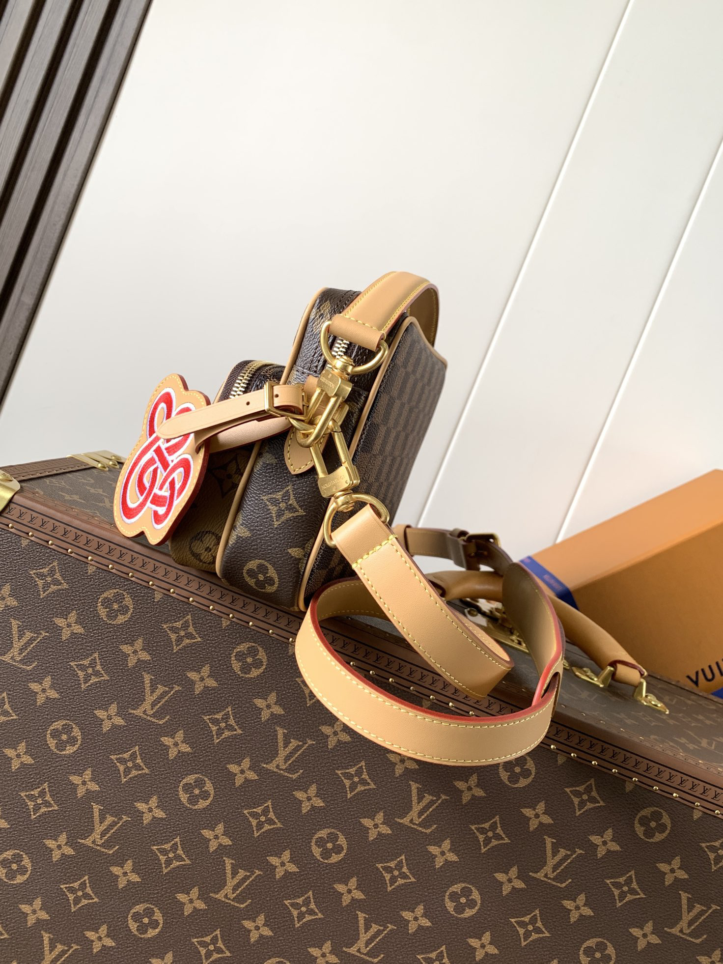 1 Louis Vuitton This Nil messenger bag features a Monogram canvas body accented with Damier and Monogram Reverse canvas patches, creating an elegant patchwork effect.