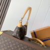 1 Louis Vuitton This Pochette Mia handbag, part of the Monogram collection, features a Monogram canvas body accented with cowhide leather trim.