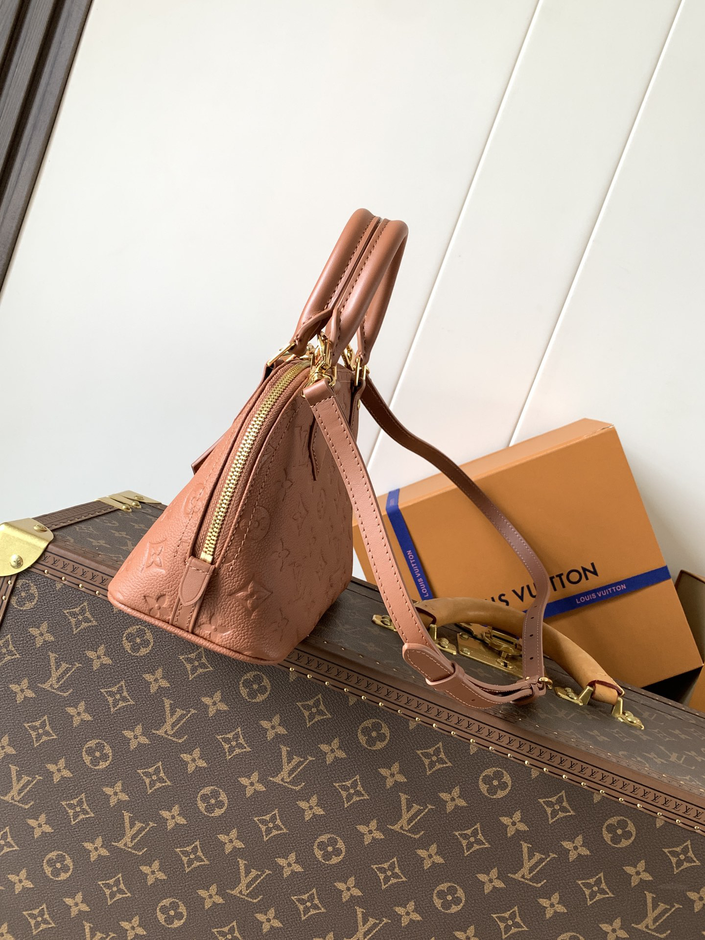 1 Louis Vuitton This Alma BB handbag showcases the iconic Alma BB silhouette, crafted from the House's exceptionally soft Monogram Empreinte leather.