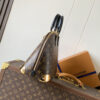 1 Louis Vuitton The Trunk collection welcomes a contemporary new iteration of the Alma Small handbag, paying homage to the brand's travel heritage with exquisite metal hardware.