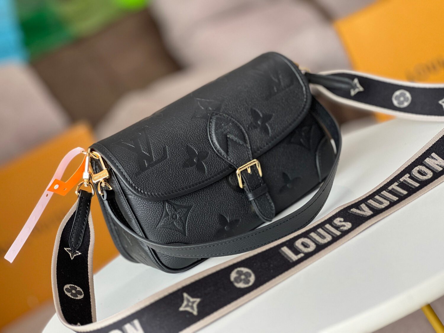 1 Louis Vuitton This Diane handbag is crafted from Louis Vuitton's classic Monogram Empreinte embossed leather.