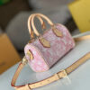 1 Louis Vuitton The Nano Speedy handbag crafted from classic Monogram canvas.