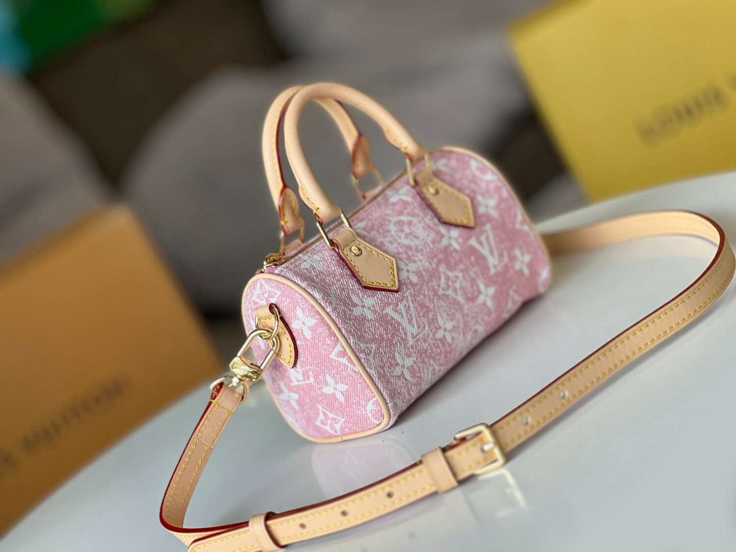 1 Louis Vuitton The Nano Speedy handbag crafted from classic Monogram canvas.