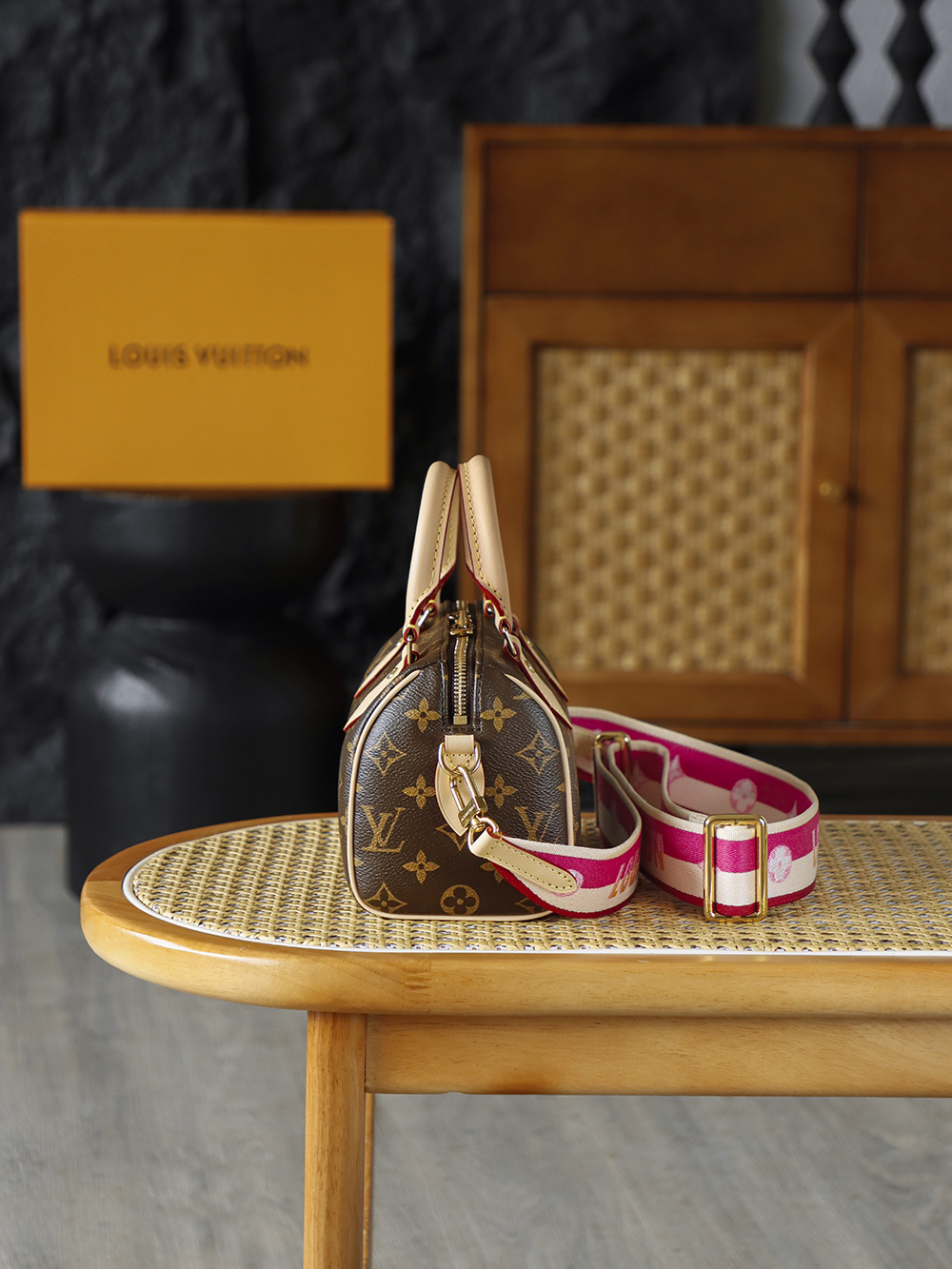 Louis Vuitton The Speedy Bandoulière 20 carries the DNA of a century-old heritage, featuring an iconic, three-dimensional "pillow" silhouette that is both sleek and structured.