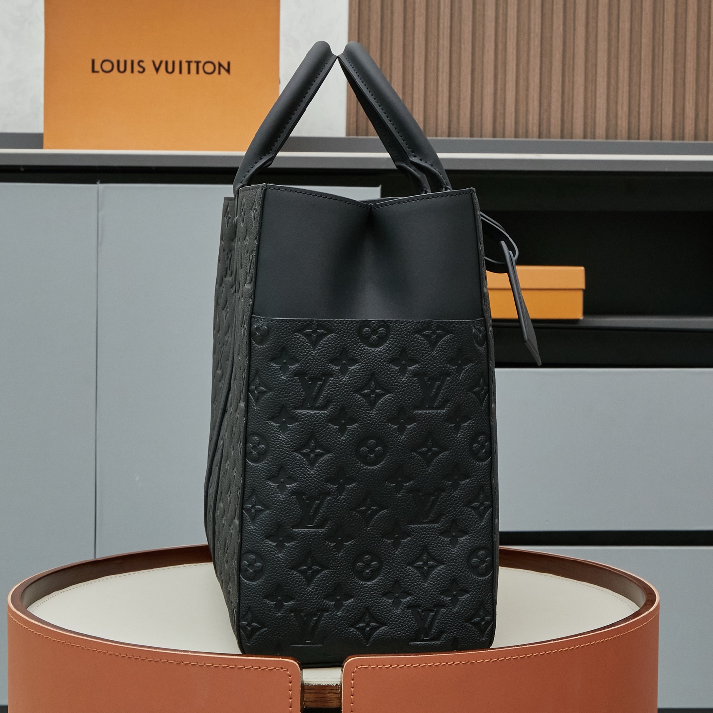 1 Louis Vuitton This Sac Plat 24H bag is crafted from Monogram-embossed Taurillon leather.