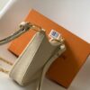 1 Louis Vuitton The Easy Pouch On Strap handbag from the Spring 2022 Collection is crafted from Monogram Empreinte leather.